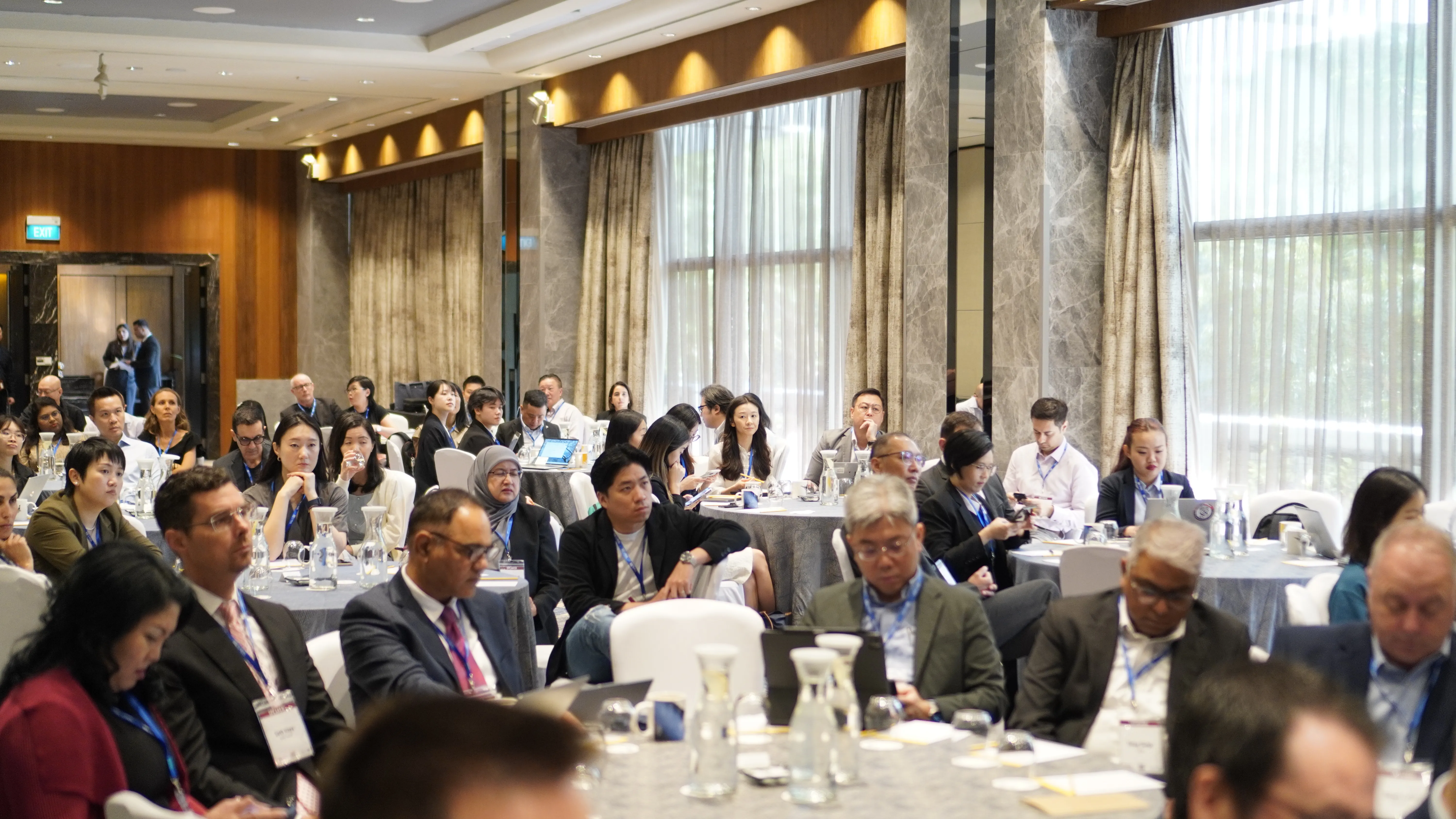Professionals collaborating at a breakfast meeting